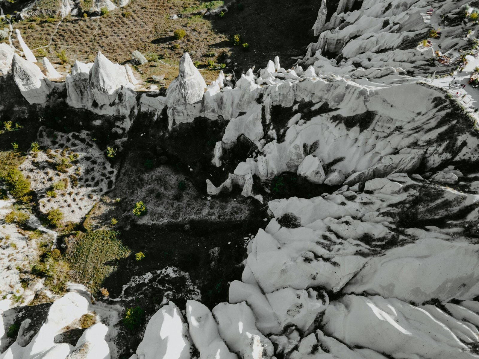 Before-and-after image showing aftermath of an unplanned avalanche event