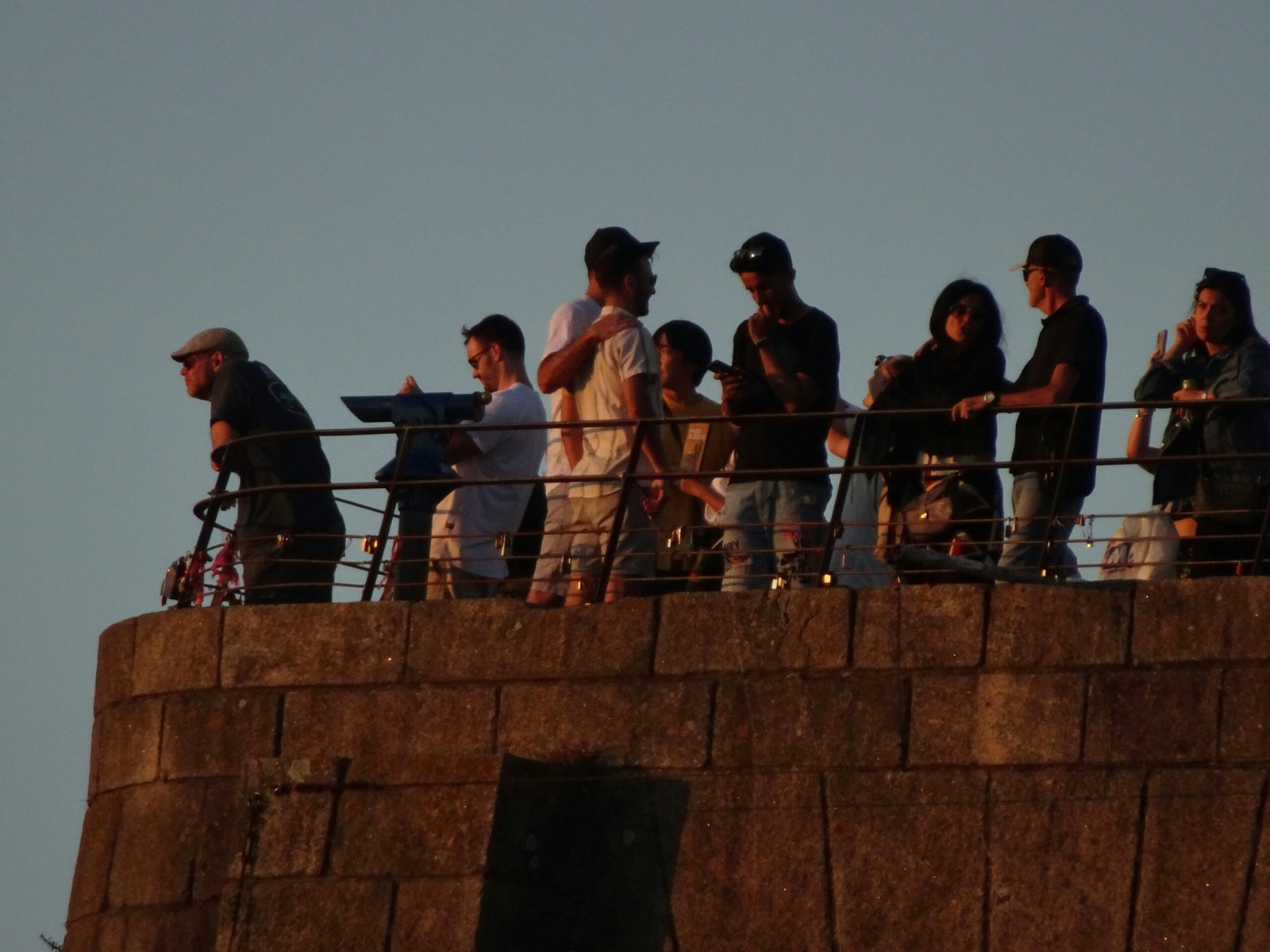 Group photo of happy cast and crew celebrating final day of shooting.