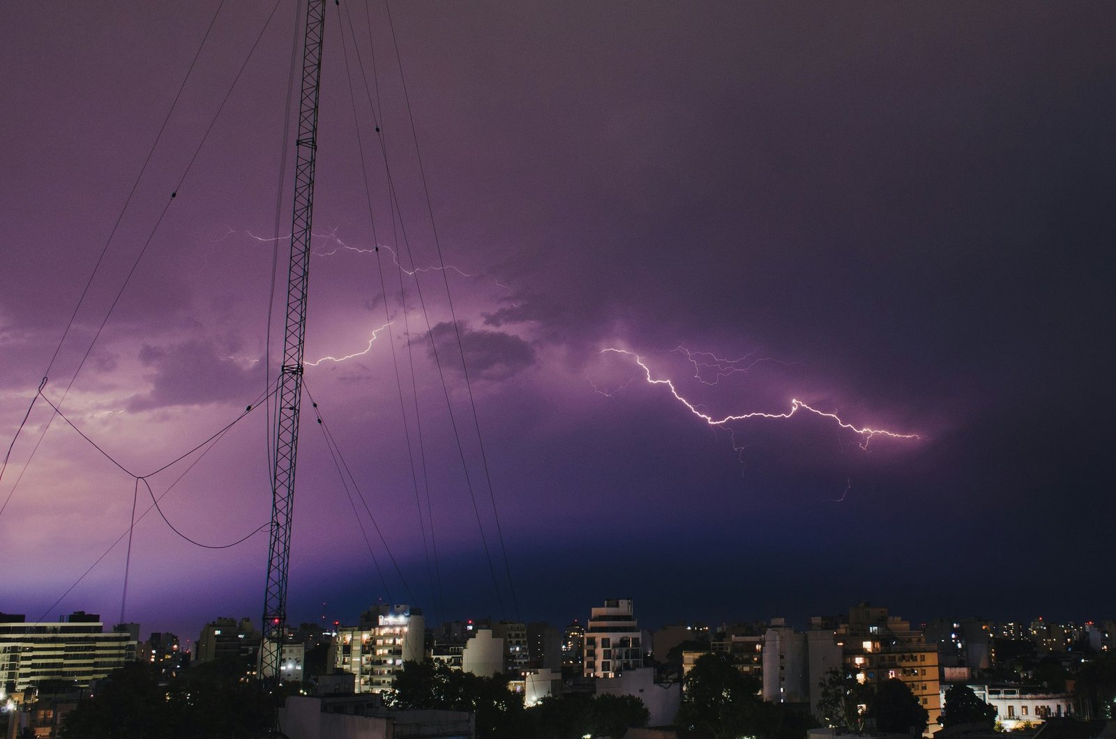 Storm approaching film set with crew rushing to secure equipment