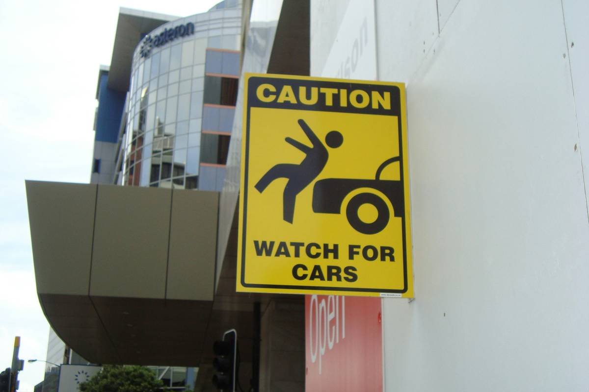 Before/after screenshots of a film production budget with and without insurance